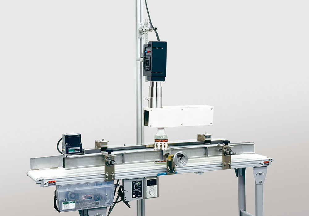 アプリケーションキャップ シュリンクユニット